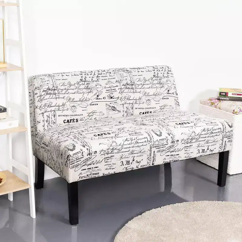 Divanetto biposto in tessuto grigio con gambe in legno